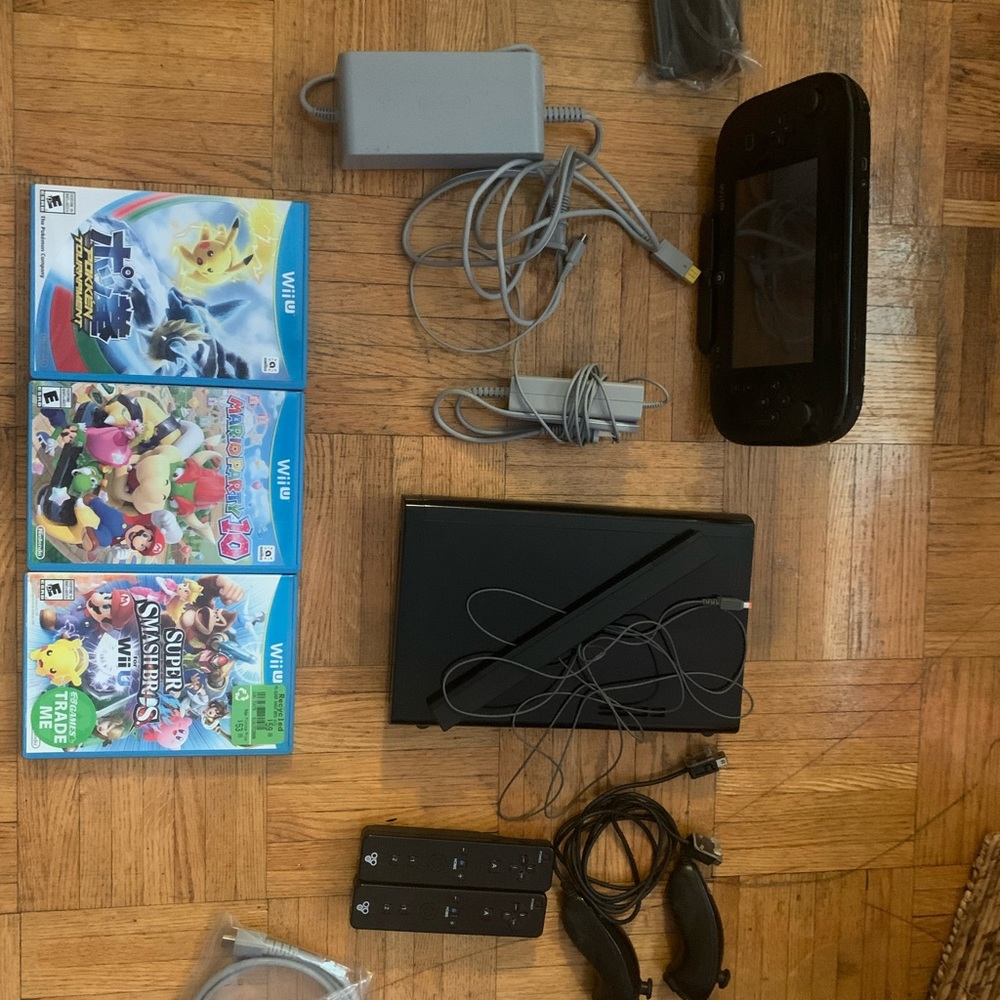 Black Wii u 32gb games included and extra controllers